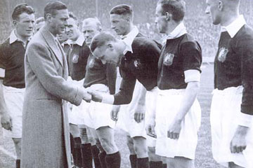 Sam Cowan introduces the future George VI to Matt Busby at the 1933 FA Cup Final