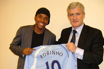 Robinho arrives for a British record transfer fee